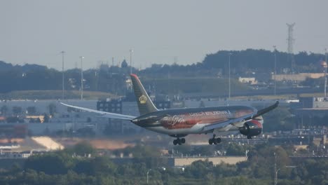 An-airliner-slowly-lands-with-passengers-at-an-airport-in-Toronto,-Canada