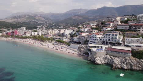 Wide-aerial-view-of-coastal-shore-of-Himare,-Albania