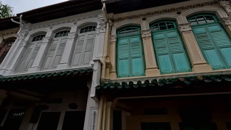 Colorful-Traditional-Houses-in-Singapore,-Details-on-Exterior,-Medium-Shot
