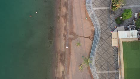 relaxing-surface-swimming-at-coral-reef-depths-of-Eilat-zion-beach-aerial