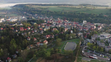 Aerial-view-at-down-of-traditional-polish-town-with-modern-roller-skating-ring