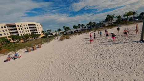 People-playing-volleyball-on-a-Florida-beach-on-a-sunny-day-at-Madeira-Beach