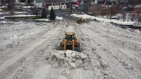 Snow-plow,-plowing-in-north-america-after-a-big-winter-storm