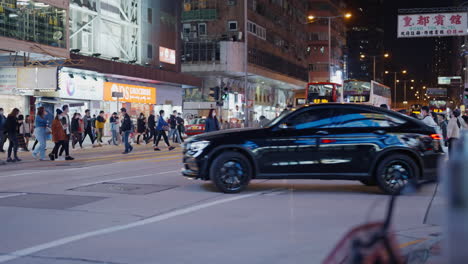 asiatic-metropolitan-area-crowded-with-people-during-night-illuminated-city-centre