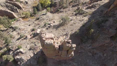 Drone-shot-of-a-popular-climbing-rock-in-Poudre-Canyon,-Colorado