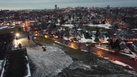 Trucks-And-Bulldozers-During-Clean-up-After-Deadly-Snow-Blizzard-In-Buffalo,-New-York-In-The-Evening