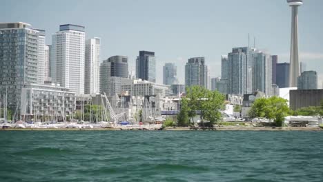 CN-Tower-in-downtown-Toronto-in-the-summer-from-a-boat-on-Lake-Ontario