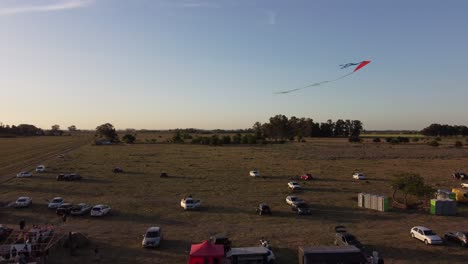 A-kite-in-flight-during-an-aeromodeling-event-in-Buenos-Aires,-Argentina