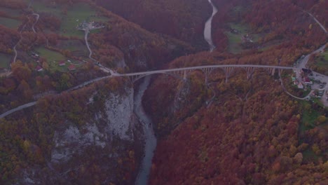 High-view-of-Durdevica-Tara-Bridge-at-sunrise-in-Montenegro,-Fall-season