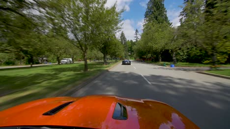 POV-from-Jaguar-of-Lamborghini-and-Mclaren-Sports-cars-driving-together-on-road