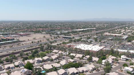 Aerial-view-of-Arizona's-expansive-neighborhoods-and-freeway-system-serving-the-retirement-community