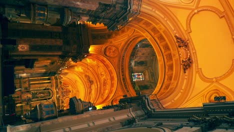 Vertical-view-of-the-sky-of-the-Metropolitan-Cathedral-of-Buenos-Aires,-illuminated-with-warm-and-epic-light