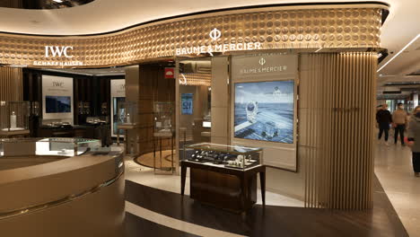Inside-luxury-watch-shop-with-extravagant-valuable-wristwatch-branding-display