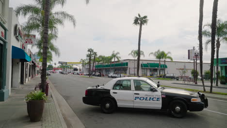 A-Police-Car-Parked-Outside-the-Lunar-New-Year-Festival-in-Monterey-Park,-After-the-Shooting