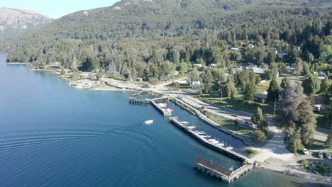 AERIAL---Pier-on-Traful-lake,-Patagonia,-Río-Negro,-Argentina,-forward-approach-shot
