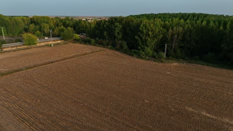 Drone-flying-over-farmland-in-small-Spanish-Town-of-Mansilla-de-las-Mules-in-Leon