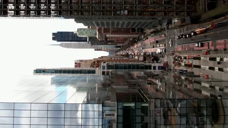 Downtown-Manhattan,-New-York-city-skyline---ascending-vertical-establishing-shot
