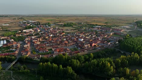 Cinematic-aerial-pan-around-small-town-village-in-Leon-Spain