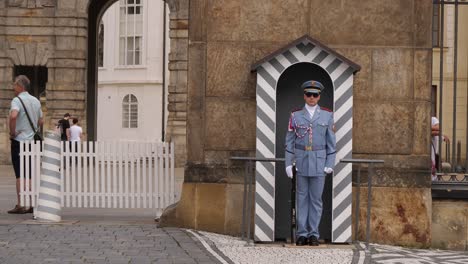 Close-up-armed-security-guard-stands-in-position-outside-Prague-Castle