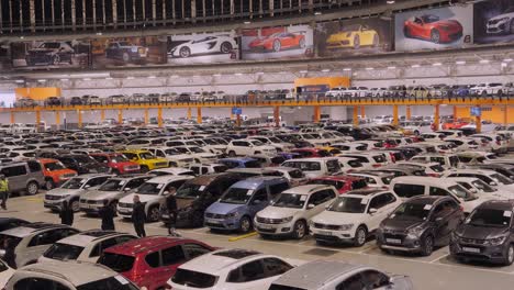 Shoppers-and-staff-inside-We-Buy-Cars-Dome-auto-dealership-in-S-Africa
