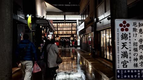 Behind-People-Walking-at-Indoor-Shopping-Mall,-Kyoto,-Japan