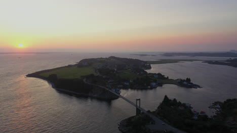 Aerial-shot-of-the-sunset-at-the-beautiful,-idyllic-island,-Herdla,-on-the-coat-of-Norway