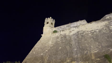Sa-Maison-Garden-wall-and-tower-seen-at-night