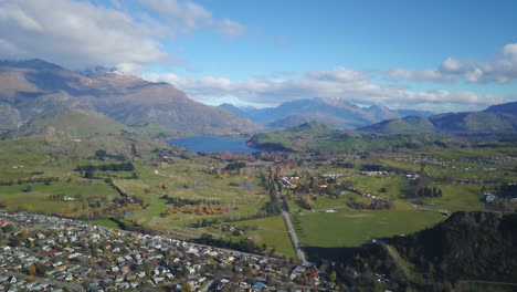 Aerial-view-of-Queenstown-during-spring-green-beautiful-mountainous-with-lakes