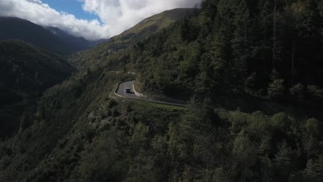 Van-car-driving-along-panoramic-road-through-French-Pyrenees