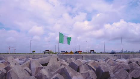 Victoria-Island,-Lagos,-Nigeria--October-1st,-2022:-Nigeria's-flag-blowing-in-the-wind-on-independence-day