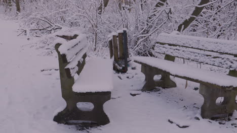 Park-Bench-Covered-With-Snow-After-The-Snowstorm-In-Winter