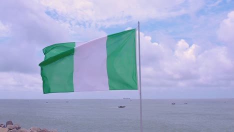 Victoria-Island,-Lagos,-Nigeria--October-1st,-2022:-Nigeria's-flag-blowing-in-the-wind-on-independence-day