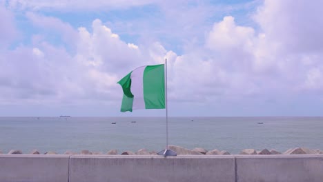 Victoria-Island,-Lagos,-Nigeria--October-1st,-2022:-Nigeria's-flag-blowing-in-the-wind-on-independence-day