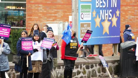 Overworked-NHS-workers-at-Whiston-hospital-in-St-Helens,-Merseyside-strike-for-fair-pay-conditions