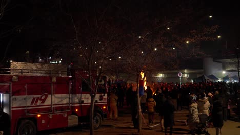 119-Seoul-Fire-Service-Firetruck-with-Flashing-Emergency-Lights-Parked-By-Jeongwol-Daeboreum-Fire-At-Night-in-Gangnam