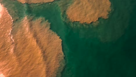 Nasty-Flood-Waters-Flow-Out-Into-The-Ocean,-Drone-View