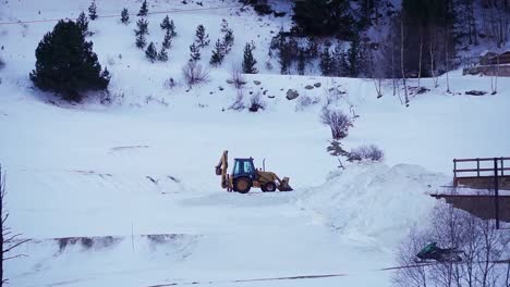 Parked-snowplow-tractor,-mountain-equipment