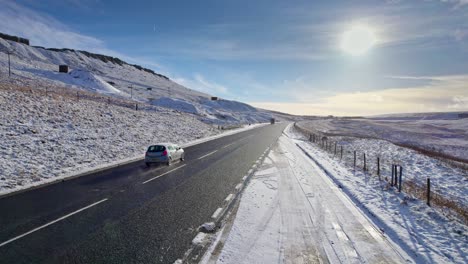 Cinematic-cold-English-winter-moorland-road-aerial-scene