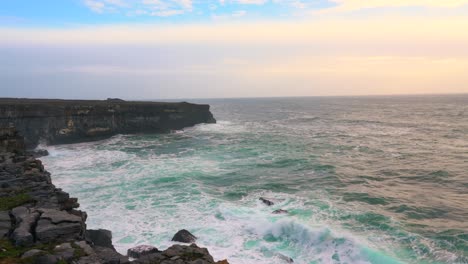 Waves-crash-up-against-the-coastline-on-the-island-of-Inis-Mór-off-the-West-Coast-of-Ireland