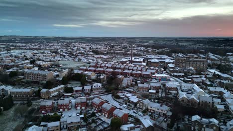 Cold-snowy-winter-Cinematic-aerial-view-of-a-delicate-Pink-And-Blue-Early-Morning-Sunrise-Sky