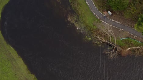 Aerial-cenital-video-of-a-river-and-path-in-Gort,-Ireland