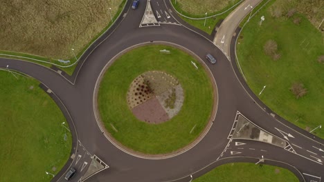 Top-aerial-shot-of-an-Irish-roundabout-with-moderate-traffic