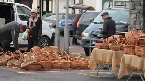 People-at-a-wicker-basket-market-at-a-local-street-stall