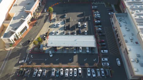 aerial-time-lapse-shows-people-waiting-in-line-to-fill-up-on-gas-at-a-busy-Costco-gas-station