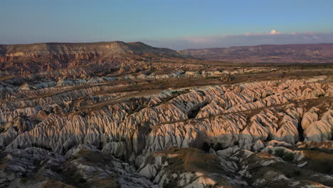 Epic-cinematic-rotating-drone-shot-of-the-rocky-mountains-surrounding-Cappadocia,-Turkey