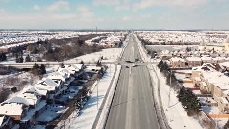 Aerial-Flying-Over-Brampton-Residential-Urban-Townscape-Towards-Car-Crash-Accident-Scene-At-Crossroad