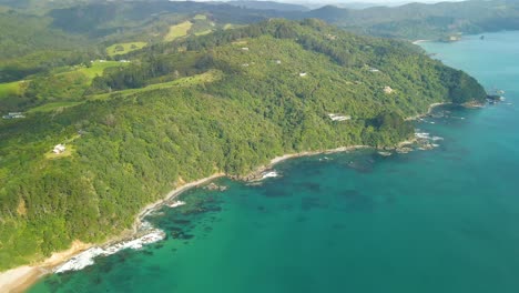 Aerial-View-Of-Tairua-Coastline-With-Turquoise-Ocean-Waters