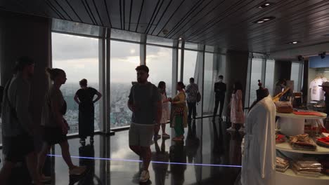 A-shot-of-people-walking-on-the-observation-deck-of-the-Bitexco-Financial-Tower-in-Ho-Chi-Minh-City-,-Vietnam