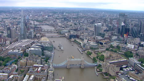 Aerial-shot-overhead-downtown-London-showing-the-London-bridge,-the-Shard