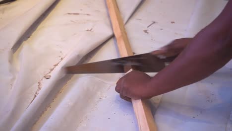 a-carpenter--cuting-the-wood--closeup-view